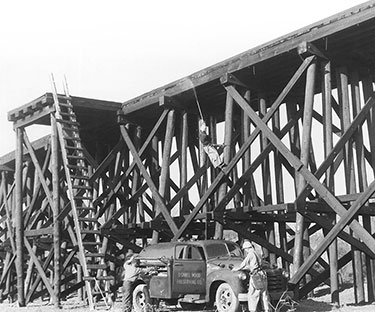 Koppers RS Workers Working Near a Bridge